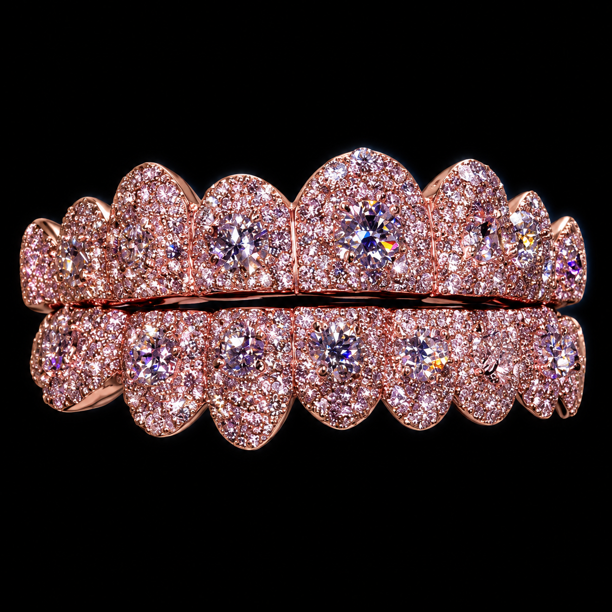 Rose-tone iced upper and lower grillz with prominent center stones